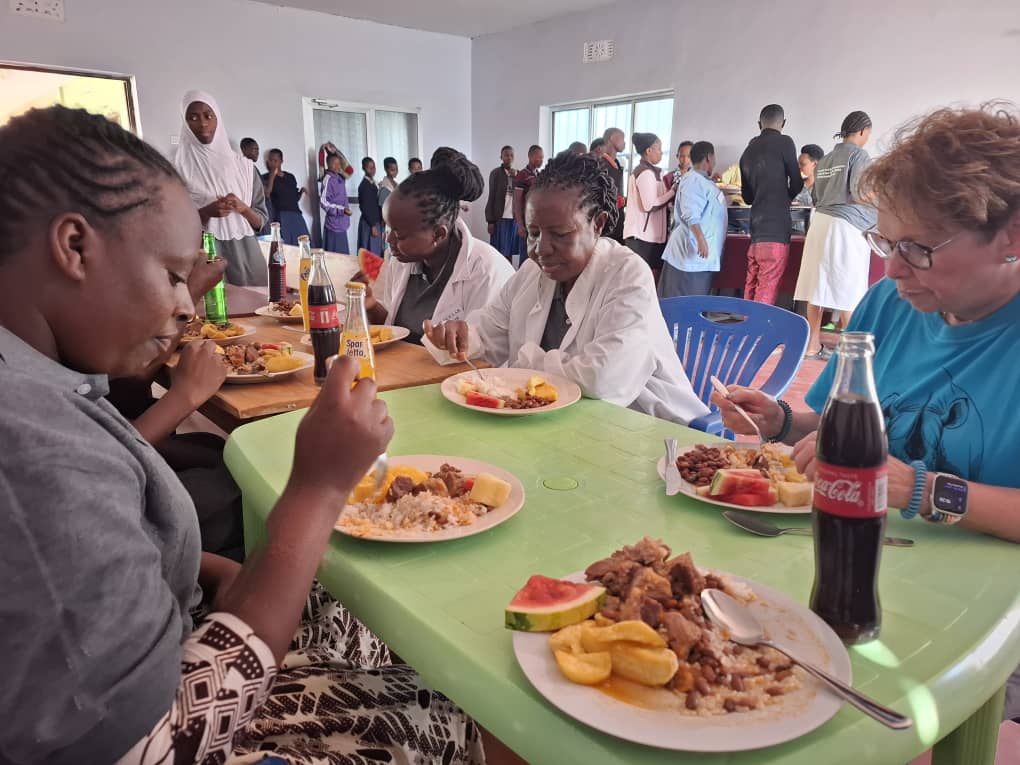 Dr. Teressa and the Lake Eyasi health care team sharing a farewell meal